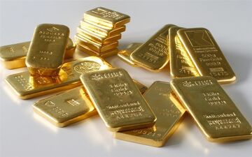  قیمت طلا به ۱۳۲۸ دلار رسید