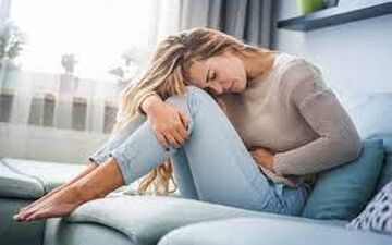 نشانه و علامت PMS چیست؟