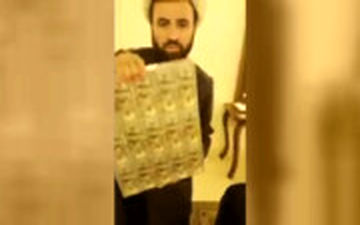 روحانی قلابی لبنانی که بین مردم دلار پخش می‌کرد