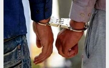 دستبند پلیس بر دستان 2 مامور قلابی