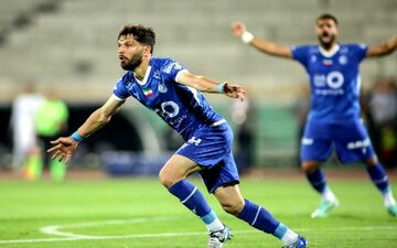 تیم ملی به سید حسین حسینی و روزبه چشمی نیاز دارد+ پوستر 