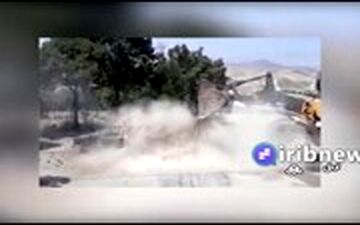 خاموش کردن پیکان آتش گرفته با لودر