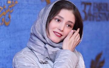 تیپ پسرانه و متفاوت فرشته حسینی | همسر نوید محمدزاده با این عکس غوغا به پا کرد!
