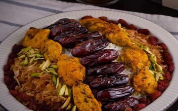 طرز تهیه خرما پلو با مرغ و کشمش| حتما امتحانش کن!