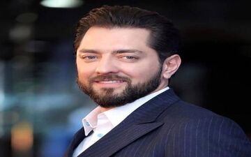 جنجال جدید بهرام رادان با این عکس|خلوت زن و شوهری در ملاعام !
