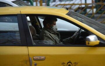 نصب برچسب «ورود بدون ماسک ممنوع» بر روی ناوگان عمومی کرمانشاه