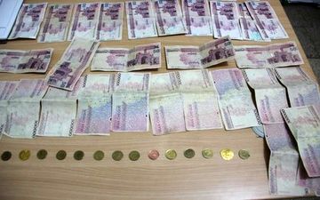 دستگیری جاعلان تراول‌چک و دلار