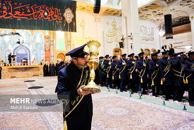 آیین شمعدان گردانی خادمان حرم حضرت معصومه(س)