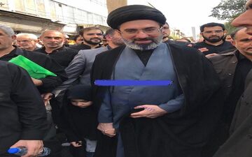 فرزند رهبر انقلاب به همراه دخترش در مراسم تشییع شهید حججى/عکس