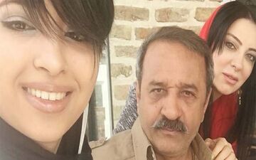 عکس خانوادگی از علی اوسیوند و حمیرا ریاضی